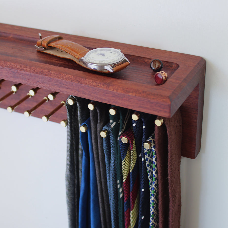 Custom Bubinga tie rack with shelf and brass pegs